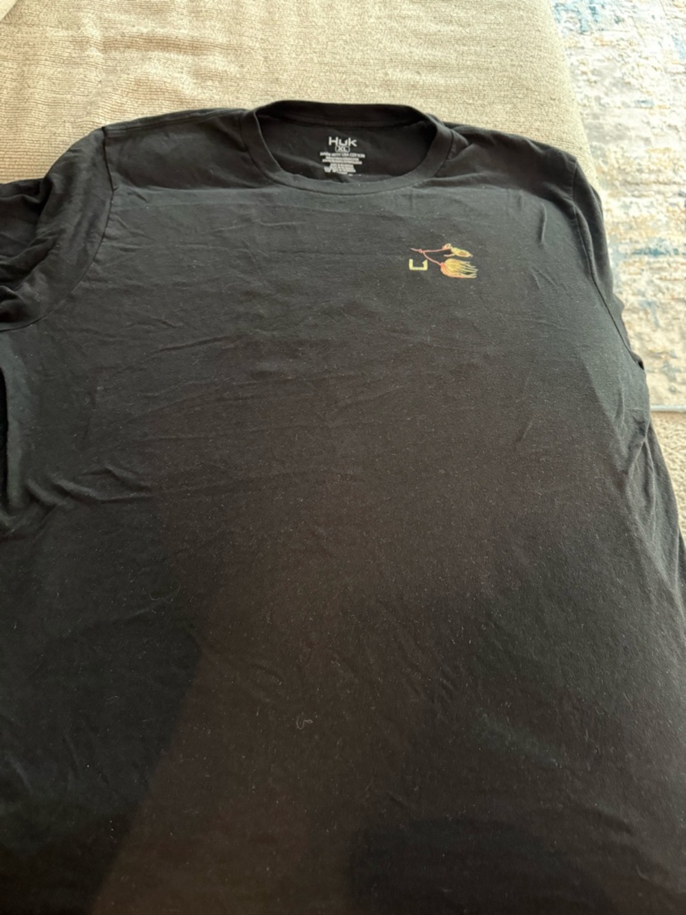 Huk Black Short Sleeve Tee with Small Multicolor Fish Logo